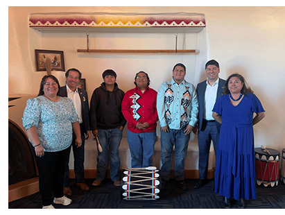 Group poses for photo at Santa Fe school