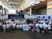 Nearly 80 employees and their family members from contractor Mission Support Alliance helped assemble 1,725 bikes for Bikes for Tikes