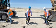 Hanford Site federal, state, and contractor officials hold shovels, signifying  construction of a 1,600-foot waste-transfer pipeline