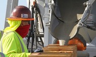Eddie Fernandez, field superintendent, monitors the flow of a test batch of engineered grout.
