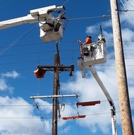 Crews updated Hanford’s massive electrical system, replacing miles of electrical lines,