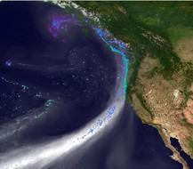 Satellite photo of the West Coast of the US with computer generated ocean currents overlaid on it