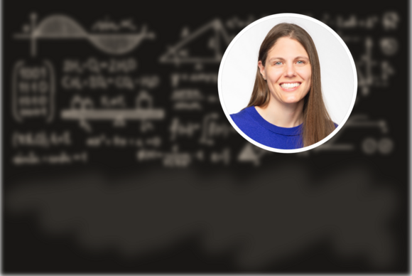 Photo of Kirstin Alberi with a background of a chalkboard with blurred equations