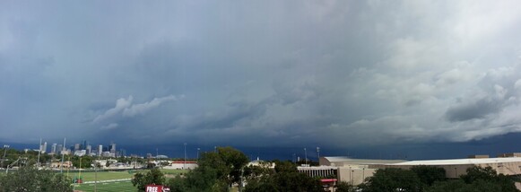 Photo of dark clouds over the Houston skyline
