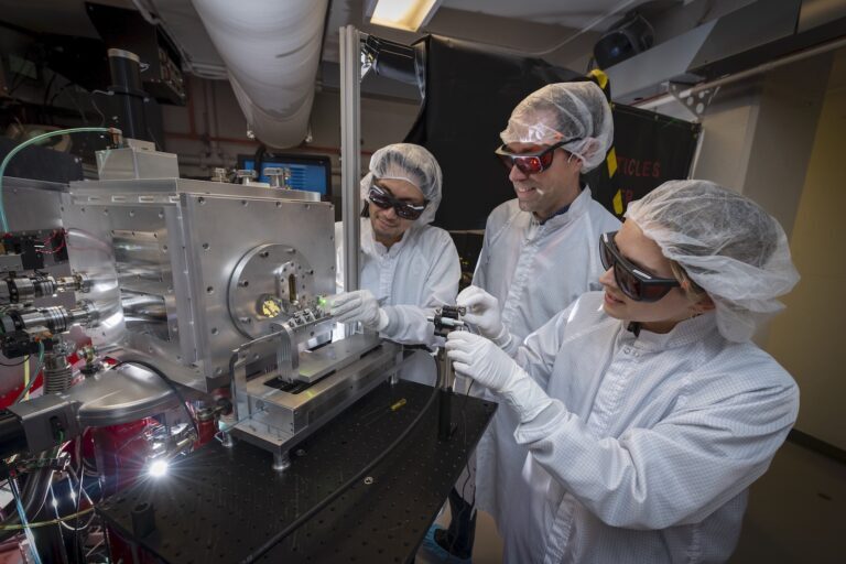 Photo of Kei Nakamura, Antoine Snijders and Lieselotte Obst-Huebl at the BELLA laser facility, working with the proton beam
