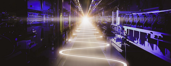 Image of a light bouncing back and forth down a hallway with a particle accelerator tube