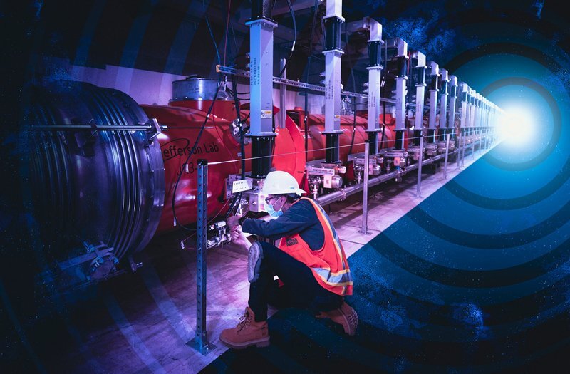 A photo of the tunnel of the LCLS-II accelerator with a technician in safety gear working on it, with an illustration behind it