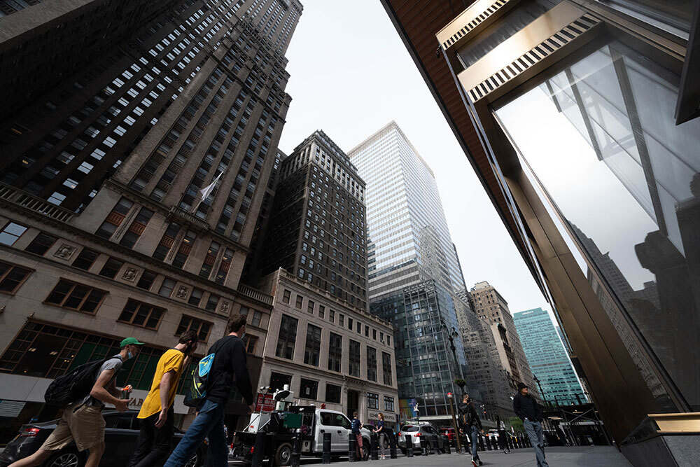 A city street with skyscrapers, from a very low point of view