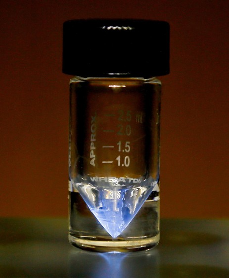 Vial of actinium-225, which glows faintly blue
