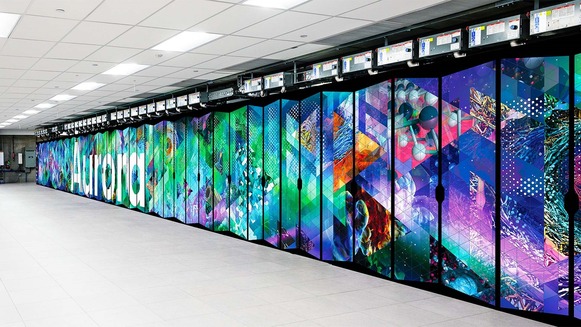 The cabinets of the supercomputer Aurora, which has a multicolored graphic on it with the computer's name