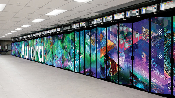 The bank of cabinets of the Aurora supercomputer, decorated with its name and abstract shapes
