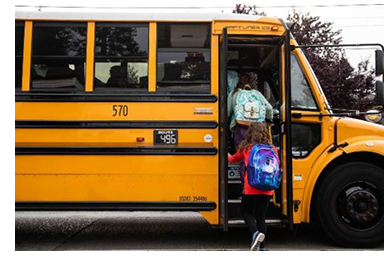 Children boarding a school bus