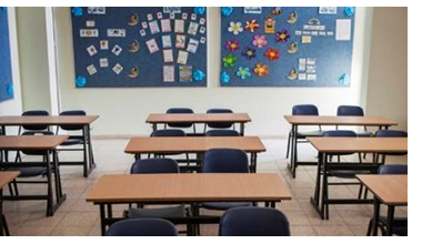 Classroom with desks and bulletin boards