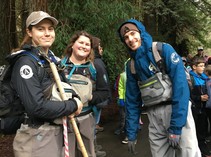 BLM and AmeriCorps employees in hiking gear.