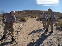 Volunteers working on a trail
