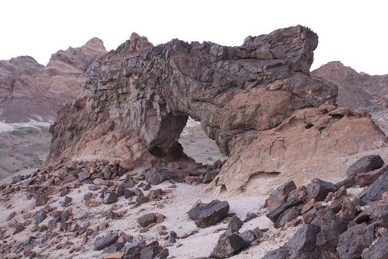 A natural arch in the desert. 