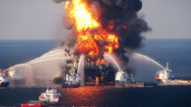 Offshore oil rig on fire.