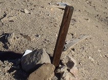Mining claim stake in the ground.