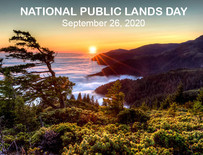 A sunset above a coastal mountain range, with text that says National Public Lands Day September 26, 2020.
