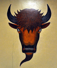 Detail of a painted bison head from Stephen Mopope's murals at the Main Interior Building