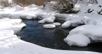 A river covered in snow.