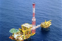 An oil rig in the ocean.