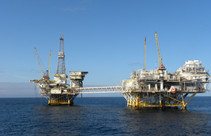 Oil rigs in the ocean.