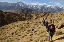 A group of hikers travel down a trail in the Alabama Hills area of California. Photo by David Kirk, Bureau of Land Management.