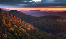 A photo from an overlook of Blueridge parkway. Forests in fall colors. 