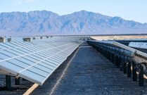 Solar panels in a desert landscape.