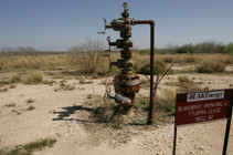 An abandoned oil well in the desert.