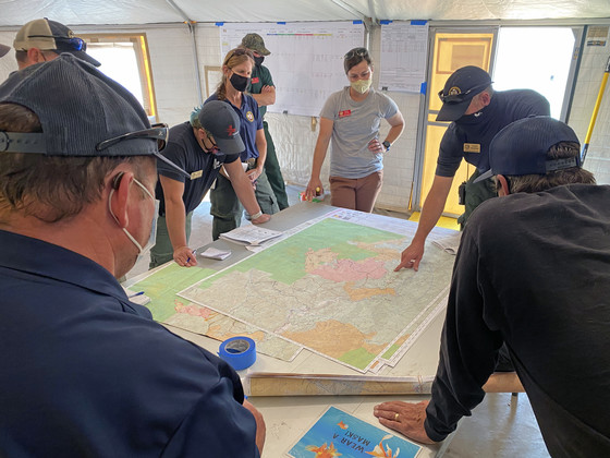 Briefing at the 2021 McCash Fire in California. Photo by Geoff Liesik, BLM.