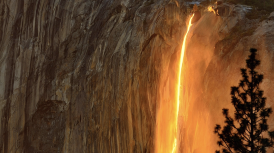 Water reflects sunlight at Horsetail Falls, Yosemite National Park