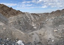 A mineral mine on the side of a mountain.