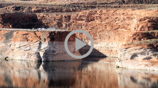 Low water levels expose many layers of rock at Lake Powell