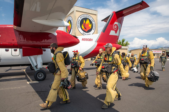 Smokejumpers prepare to board plane at the National Interagency Fire Center in Idaho. Photo by Neal Herbert, DOI.