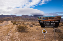 A sign in the desert that reads Old Spanish National Historical Trail.