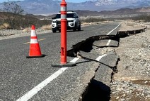 a road with damage to the cement.