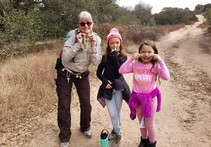 Ranger Tammy and two children posing for a photo.