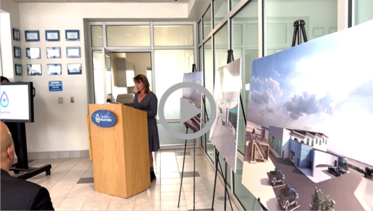 Assistant Secretary for Water and Science Tanya Trujillo speaks behind a podium at an El Paso Texas water facility