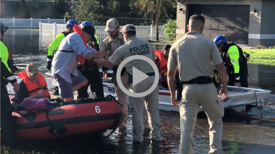 Interior law enforcement officers help rescue Florida residents after Hurricane Ian