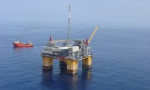 An oil platform in the ocean.