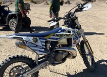 A sheriff motorcycle in the desert.