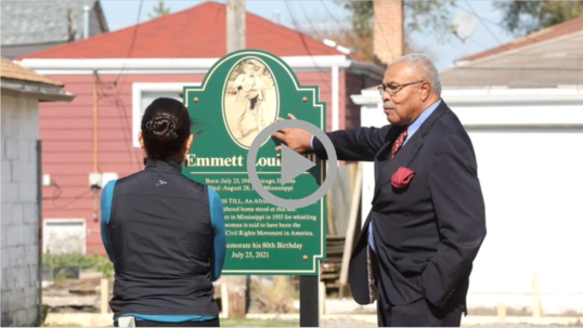 Secretary Haaland looks at sign denoting birthplace of Emmet Till