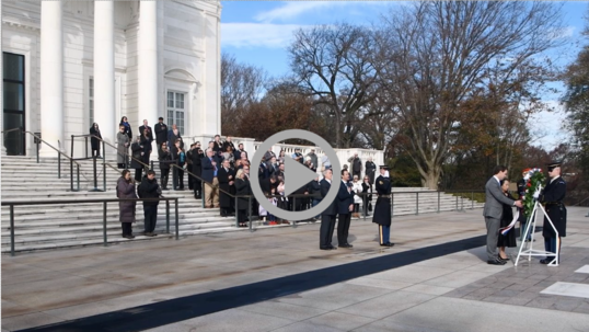 Officials watch as Bureau of Reclamation Commissioner Touton helps place a wreath at the Tomb of the Unknown Soldier in Arlington National Cemetery