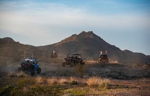 Multiple off road vehicles in the desert