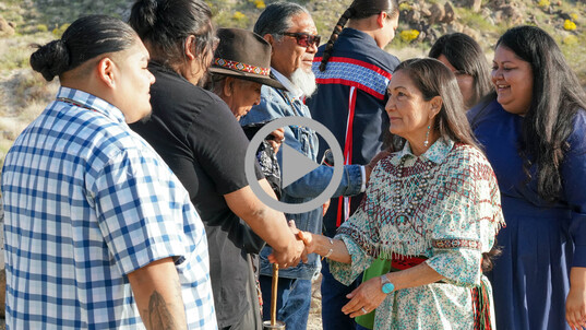 Secretary Haaland meets and shakes hands with Tribes, community members and elected leaders at Avi Kwa Ame National Monument in Nevada. 