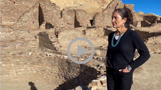 Secretary Haaland stands amid the ruins of an ancestral Pueblo village at Chaco Culture National Historical Park.