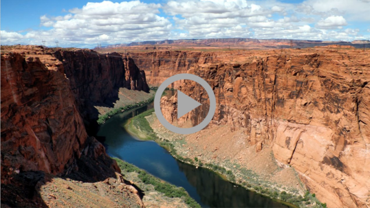 Aerial view of the Colorado River flowing through a desert canyon.