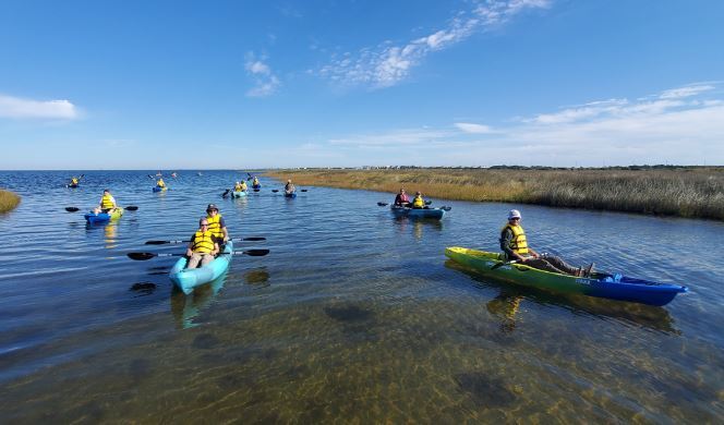 Visitors kayaking with a ranger at Cape Hatteras National Seashore